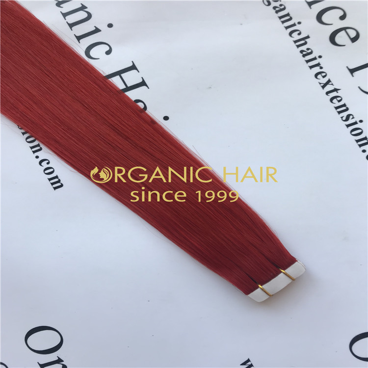 Red color hair tape in hair extensions H88